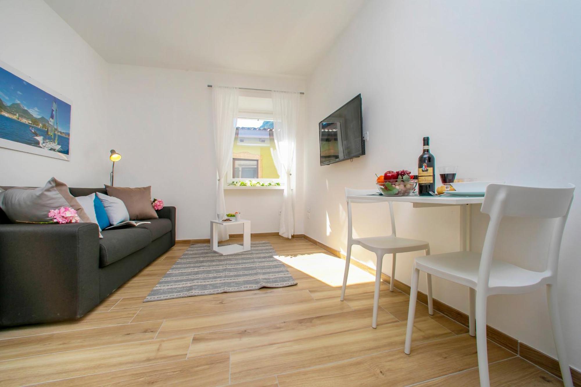 Nido Sui Tetti Di Riva Del Garda - Happy Rentals Exterior photo
